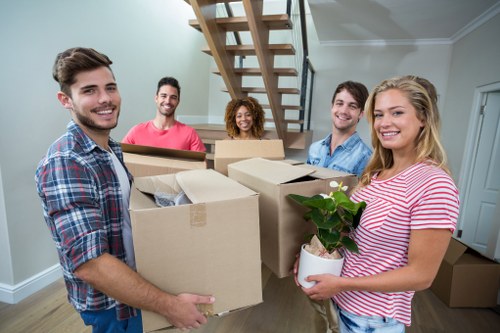 A moving van and helper in Fulham handling a local household move