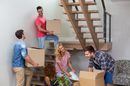 Labelled moving boxes and packing supplies for a Fulham home move
