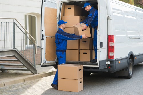 Packed boxes and household items ready for house removals in Fulham