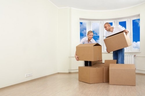 Professional office removals team handling furniture and IT equipment