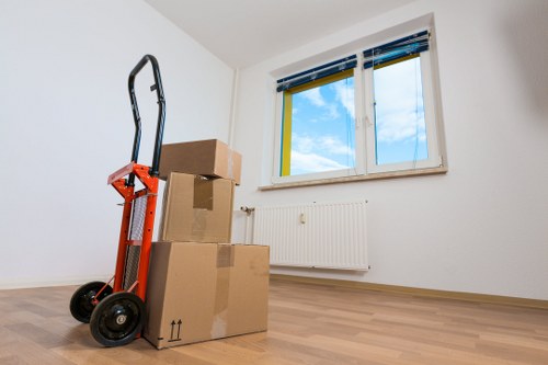 Careful wrapping of fragile household items during packing service in Fulham